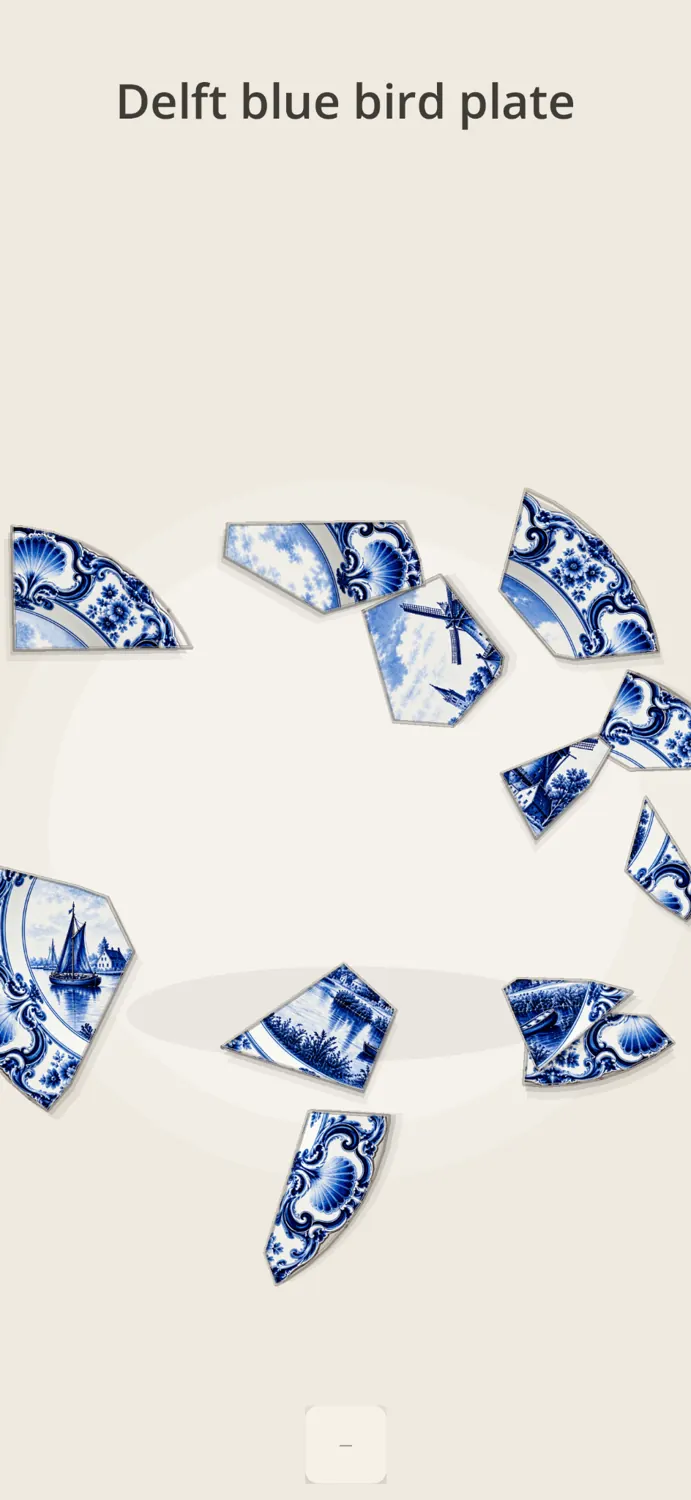 The Delft blue plate scattered into ceramic fragments.