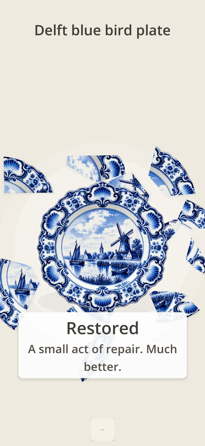 The restored Delft blue plate and its quiet completion message.
