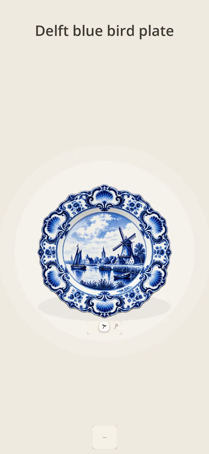 An intact Delft blue plate before breaking begins.